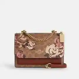 Coach Outlet：樱花粉新品 麻将包$119