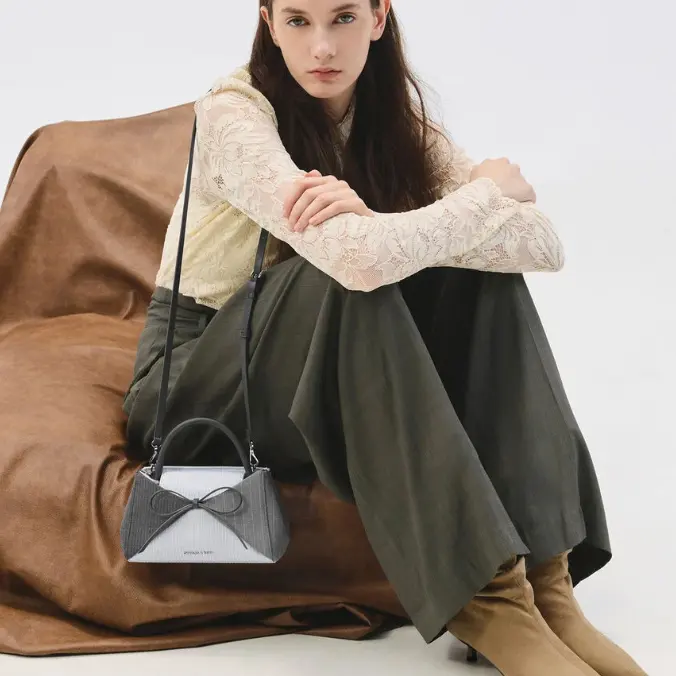 Charles & Keith US：鞋包上新！条纹蝴蝶结拼接手提包$86