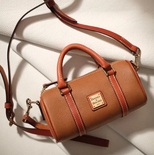 Dooney & Bourke 鹅卵石纹斜挎圆筒包 20
