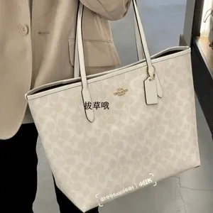 补货！COACH 蔻驰 City 女款冰川白老花托特包