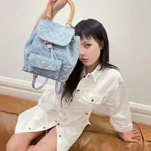 泫雅同款！COACH Riya 21新款香布雷单宁双肩包