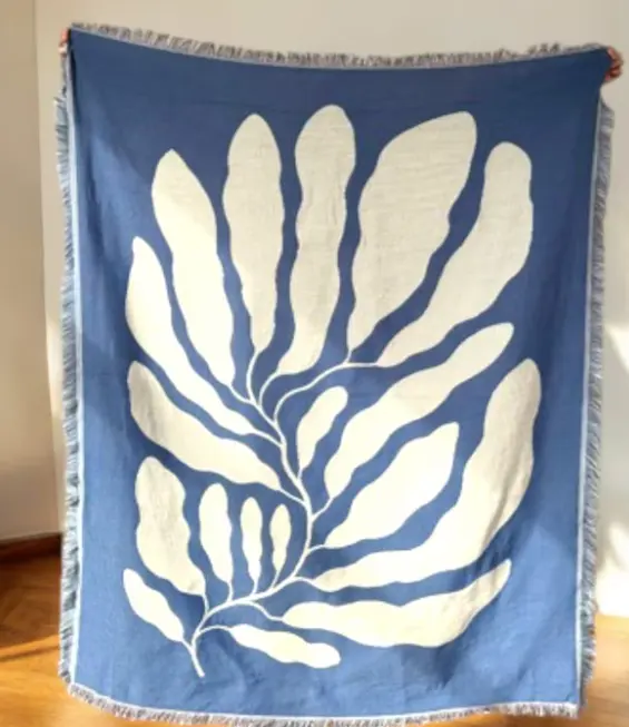 Blue Matisse Leaf Throw Blanket: Modern Woven Design